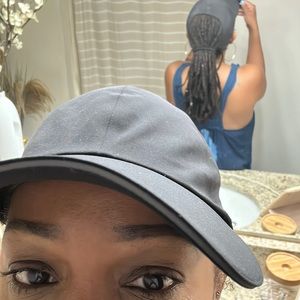 Lululemon baseball ponytail hat. Barely worn. Must sell. Price is negotiable